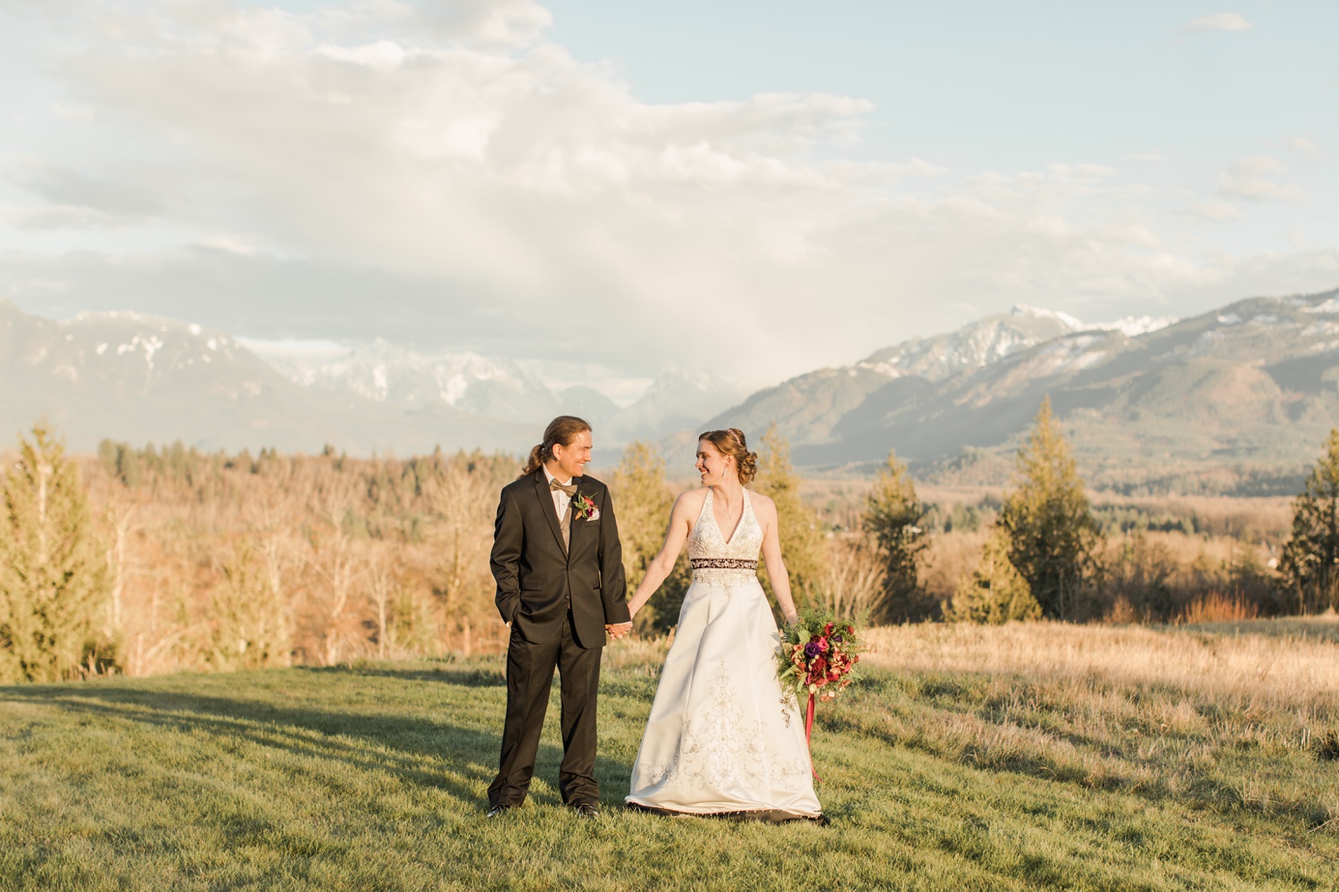 bride & groom at wedding in foothills of mountains near snohomish, wa.