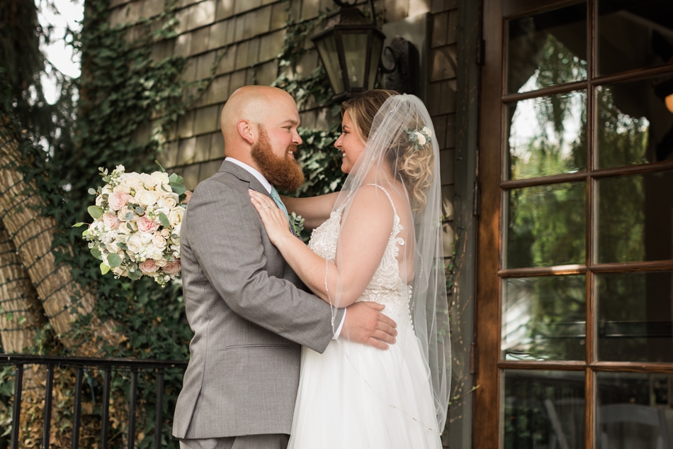 Photo of bride and groom embracing at a Hidden Meadows Farms wedding in Snohomish, a rustic yet elegant wedding venue near Seattle. | Joanna Monger Photography